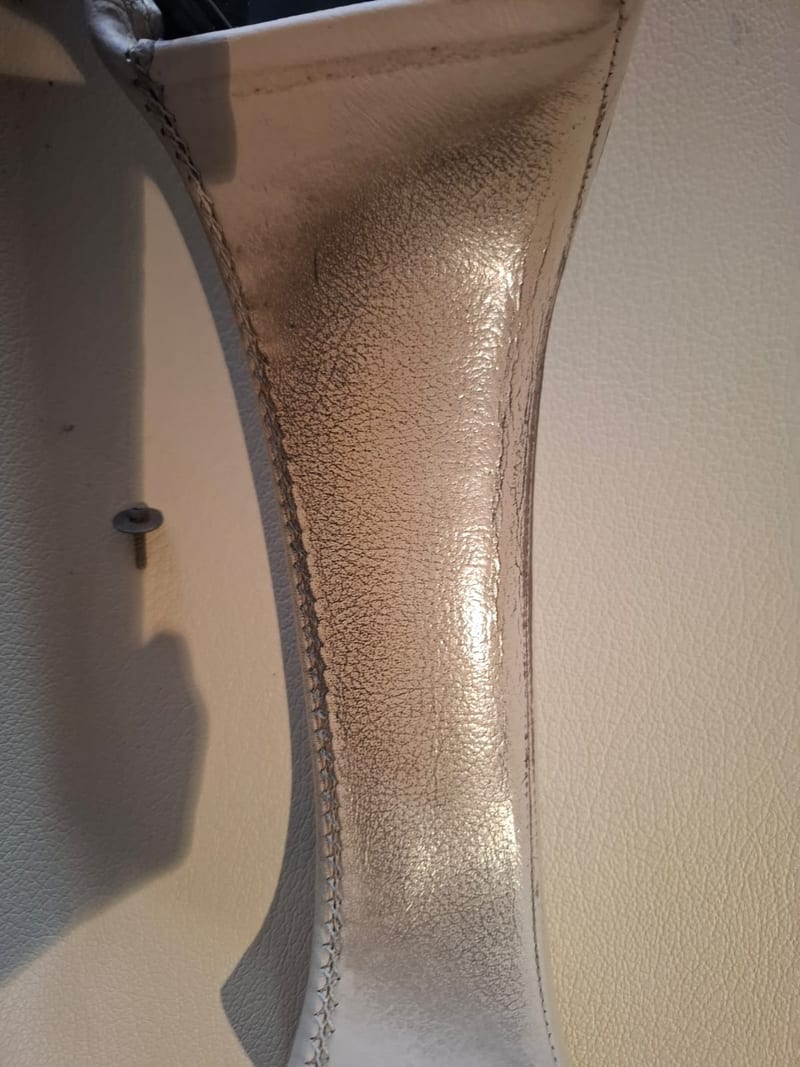 Car interior leather trim before detailing — worn and soiled, Johannesburg North